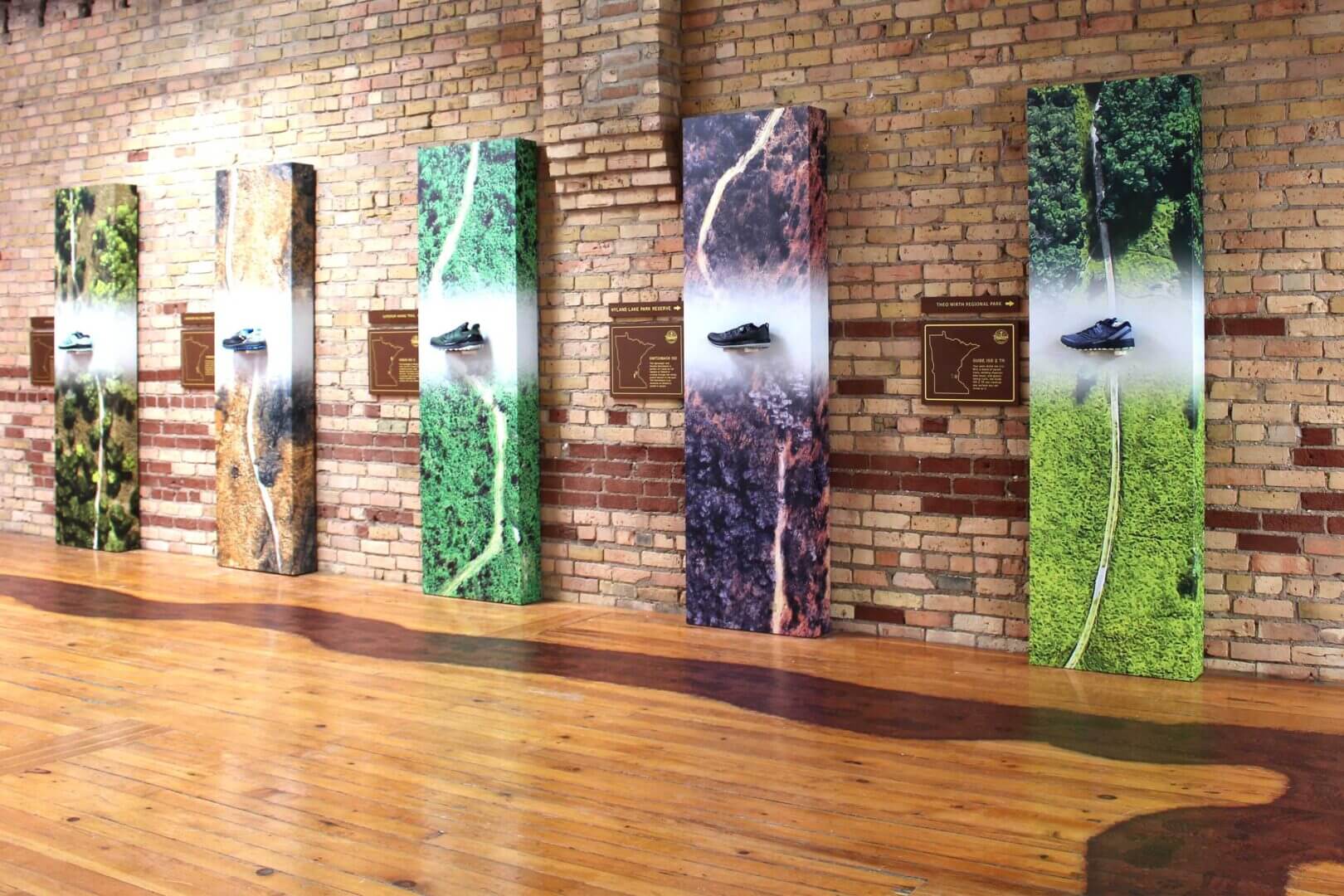 Saucony running shoes displayed on wall popup in a showroom