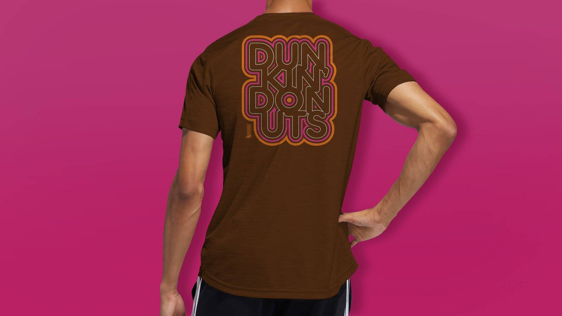 A person in a brown Dunkin' Donuts tshirt